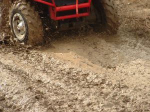 atv%20all%20terrain%20vehicle%20red%20in%20mud.jpg