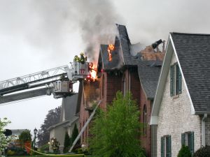 fires%20burns%20house%20fire%20with%20fire%20rescue%20ladder.jpg