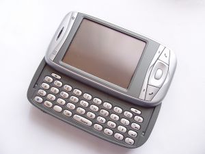 technology%20mobile%20cell%20phone%20with%20key%20pad%20silver.jpg